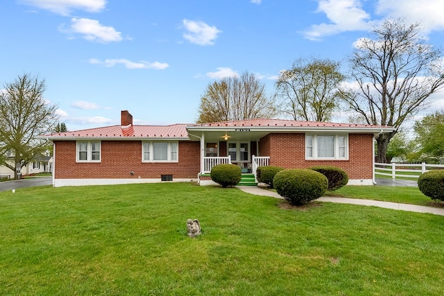 480 N 3rd St, Wytheville, VA 24382 - single story home featuring covered porch, brick siding, a chimney, and metal roof