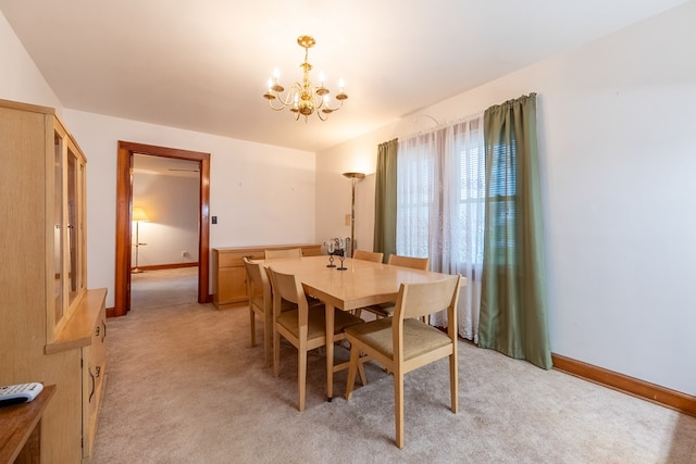 480 N 3rd St, Wytheville, VA 24382 - dining area featuring a chandelier, light colored carpet, and baseboards