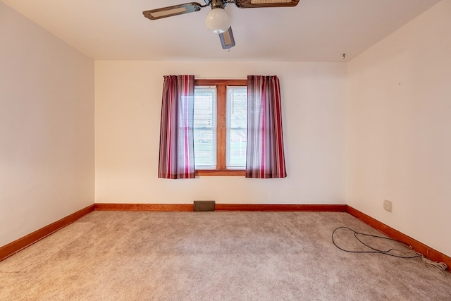 480 N 3rd St, Wytheville, VA 24382 - empty room featuring carpet flooring, baseboards, and a ceiling fan