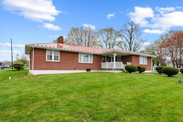 480 N 3rd St, Wytheville, VA 24382 - rear view of property with a porch, brick siding, a chimney, and a lawn