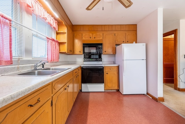 480 N 3rd St, Wytheville, VA 24382 - kitchen featuring freestanding refrigerator, range with electric stovetop, black microwave, a sink, and light countertops