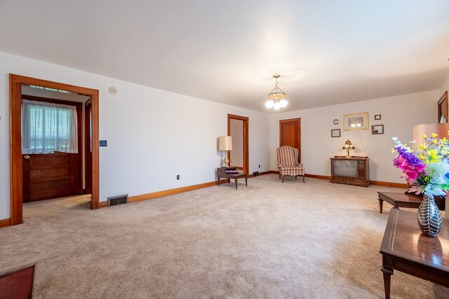 480 N 3rd St, Wytheville, VA 24382 - sitting room with a chandelier, baseboards, and light colored carpet