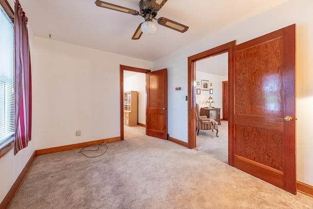 480 N 3rd St, Wytheville, VA 24382 - unfurnished bedroom with carpet floors, baseboards, and a ceiling fan