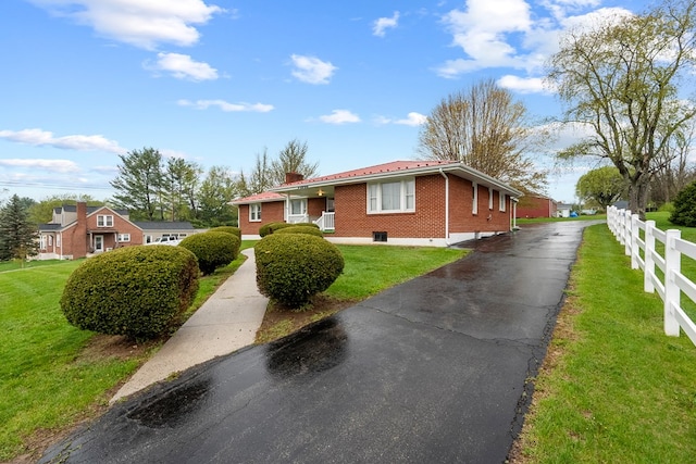 480 N 3rd St, Wytheville, VA 24382 - single story home with brick siding, a chimney, and driveway