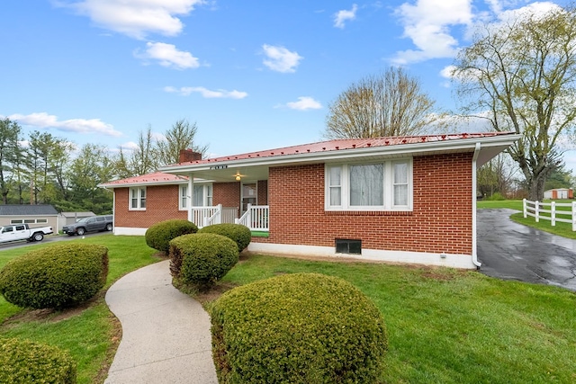 480 N 3rd St, Wytheville, VA 24382 - single story home featuring brick siding, covered porch, and a chimney