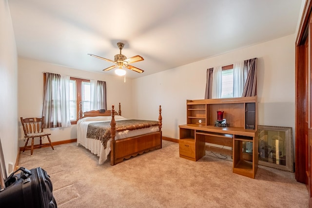 480 N 3rd St, Wytheville, VA 24382 - bedroom with multiple windows, light carpet, a ceiling fan, and baseboards