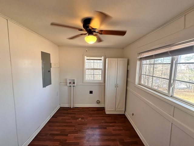 laundry room featuring ceiling fan, washer hookup, baseboards, electric panel, and dark wood-style floors