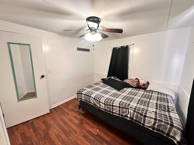 bedroom with wood finished floors and a ceiling fan