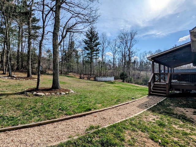 285 Dye Dr, Pilot, VA 24138 - view of green lawn with a deck