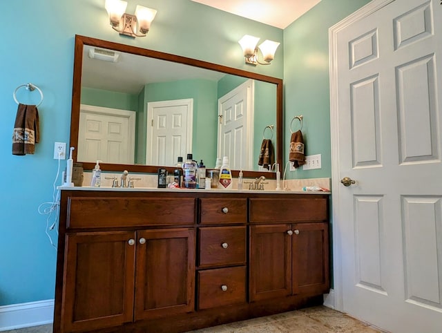 285 Dye Dr, Pilot, VA 24138 - bathroom with double vanity and baseboards