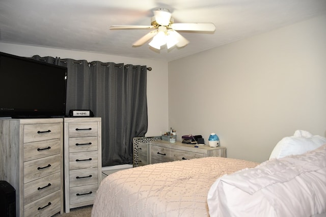 bedroom featuring a ceiling fan and carpet flooring