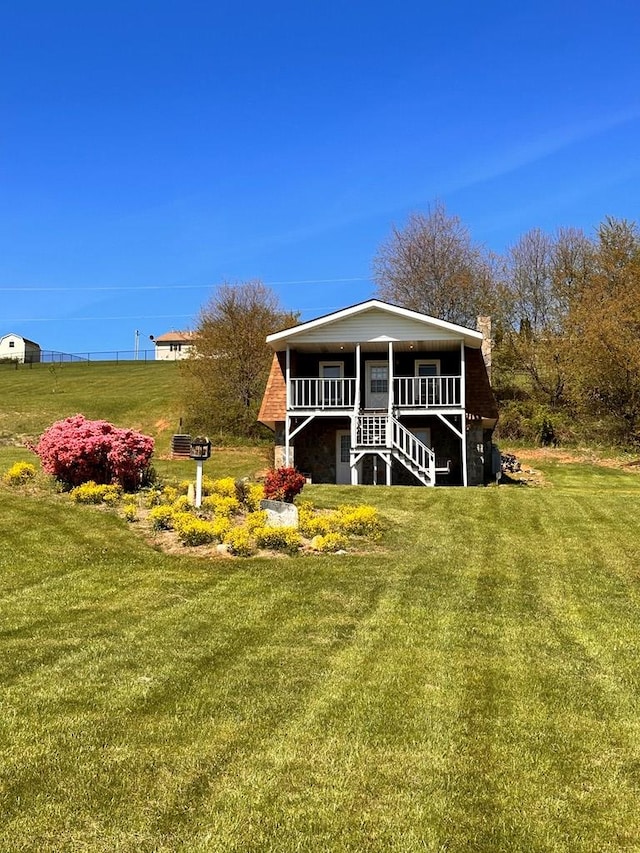 542 Volunteer Rd, Fancy Gap, VA 24328 - rear view of property with a yard, stairs, and a chimney
