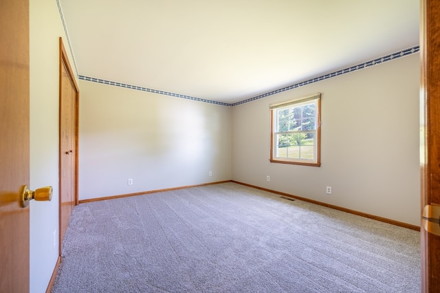 8214 Snake Creek Rd, Hillsville, VA 24343 - spare room featuring carpet and baseboards