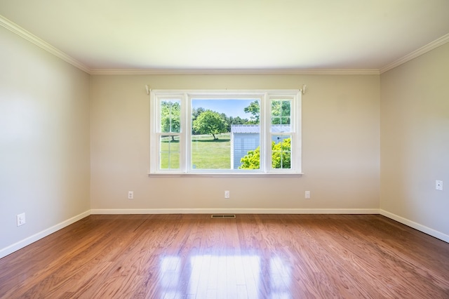 8214 Snake Creek Rd, Hillsville, VA 24343 - empty room with wood finished floors and crown molding