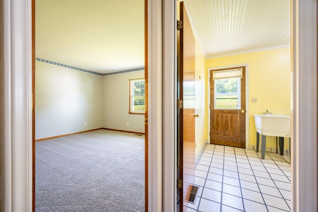 8214 Snake Creek Rd, Hillsville, VA 24343 - hallway with ornamental molding and light carpet