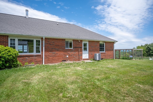 8214 Snake Creek Rd, Hillsville, VA 24343 - back of property featuring brick siding, a yard, and roof with shingles