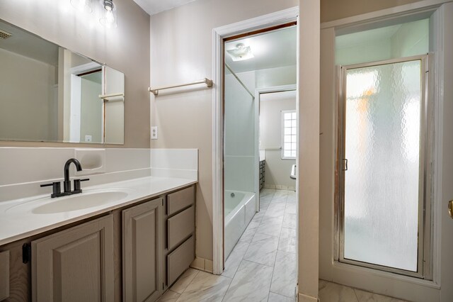 8214 Snake Creek Rd, Hillsville, VA 24343 - full bathroom featuring marble look tiles, a stall shower, vanity, and a tub