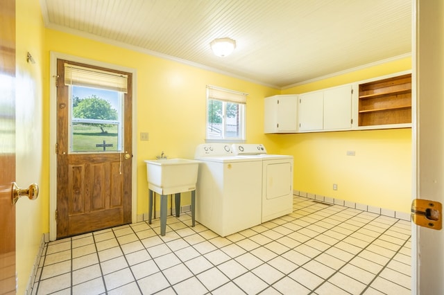 8214 Snake Creek Rd, Hillsville, VA 24343 - laundry room with cabinet space, washer and dryer, light tile patterned flooring, and ornamental molding