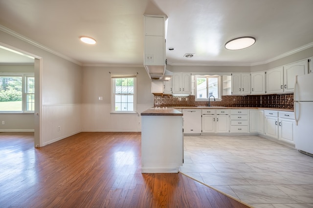 8214 Snake Creek Rd, Hillsville, VA 24343 - kitchen with white appliances, dark countertops, white cabinets, open shelves, and a wainscoted wall