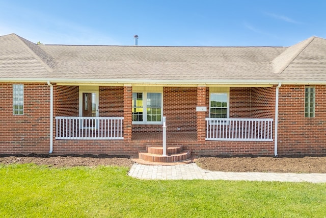 8214 Snake Creek Rd, Hillsville, VA 24343 - view of front of house featuring brick siding, roof with shingles, and a front yard