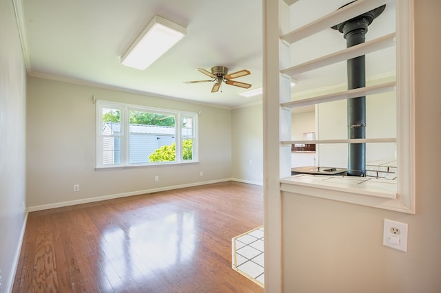 8214 Snake Creek Rd, Hillsville, VA 24343 - empty room featuring ornamental molding, ceiling fan, and wood finished floors
