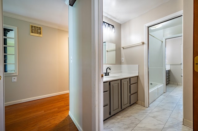 8214 Snake Creek Rd, Hillsville, VA 24343 - bathroom featuring vanity, ornamental molding, washtub / shower combination, and marble finish flooring