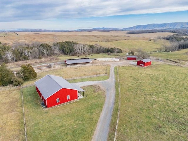 bird's eye view featuring a rural view and a mountain view