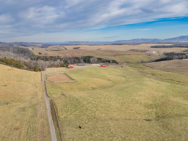 aerial view featuring a rural view and a mountain view