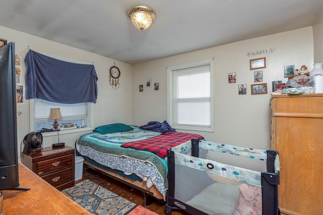 bedroom featuring wood-type flooring