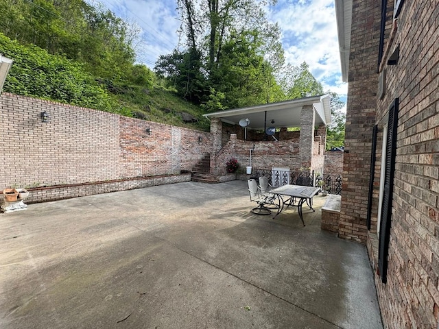 1595 Edgewater Dr, Grundy, VA 24614 - view of patio / terrace featuring outdoor dining space and fence