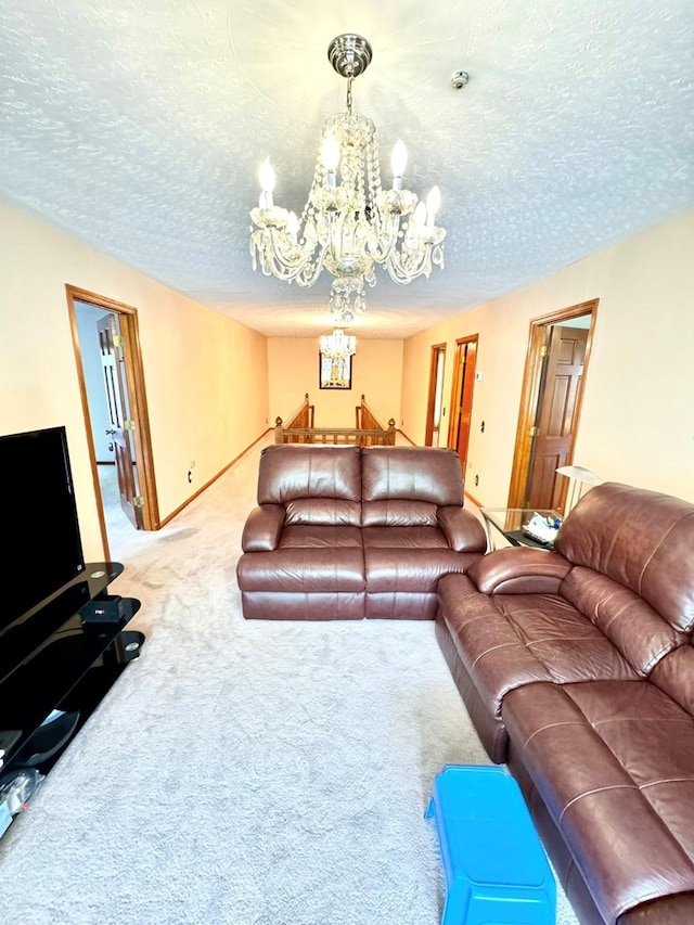 1595 Edgewater Dr, Grundy, VA 24614 - carpeted living room with a chandelier and a textured ceiling