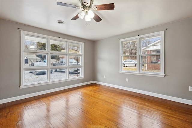 409 Crescent Dr, Glade Spring, VA 24340 - empty room with plenty of natural light, light wood-style flooring, baseboards, and a ceiling fan