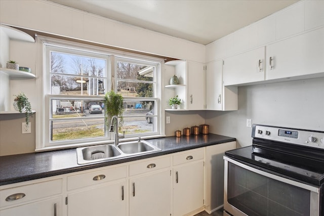 409 Crescent Dr, Glade Spring, VA 24340 - kitchen with open shelves, electric stove, a sink, dark countertops, and white cabinetry