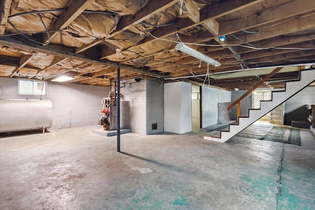409 Crescent Dr, Glade Spring, VA 24340 - basement featuring heating fuel, stairs, and healthy amount of natural light