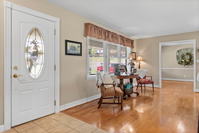 7268 Southern View Rd, Bristol, VA 24202 - foyer with baseboards and light wood-style floors