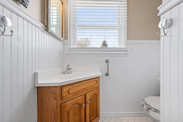 7268 Southern View Rd, Bristol, VA 24202 - half bath featuring vanity, toilet, and a wainscoted wall