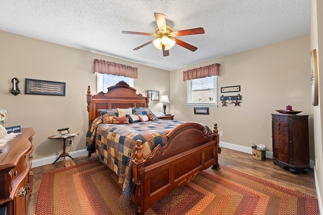 7268 Southern View Rd, Bristol, VA 24202 - bedroom with ceiling fan, a textured ceiling, baseboards, and wood finished floors