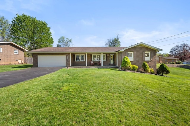 7268 Southern View Rd, Bristol, VA 24202 - ranch-style house with covered porch, an attached garage, brick siding, and driveway