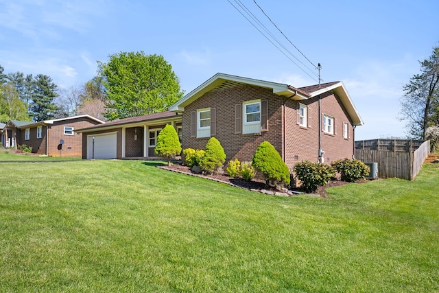 7268 Southern View Rd, Bristol, VA 24202 - ranch-style house featuring a front yard, brick siding, an attached garage, and fence