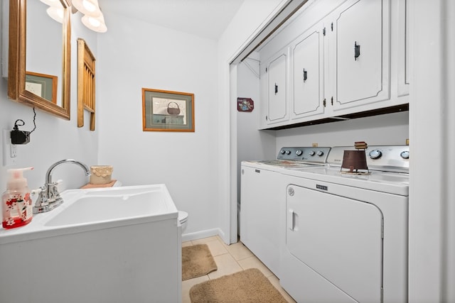 7268 Southern View Rd, Bristol, VA 24202 - laundry room featuring washing machine and dryer, light tile patterned floors, baseboards, a sink, and laundry area