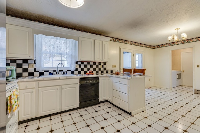 kitchen with tile counters, white cabinets, dishwasher, a peninsula, and a sink