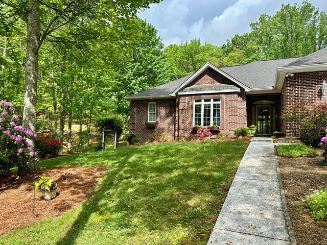 23677 Archery Range Rd, Bristol, VA 24202 - view of front of property featuring brick siding, a front yard, and roof with shingles