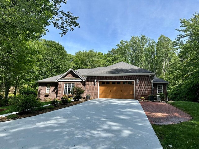 23677 Archery Range Rd, Bristol, VA 24202 - single story home with an attached garage, concrete driveway, and brick siding
