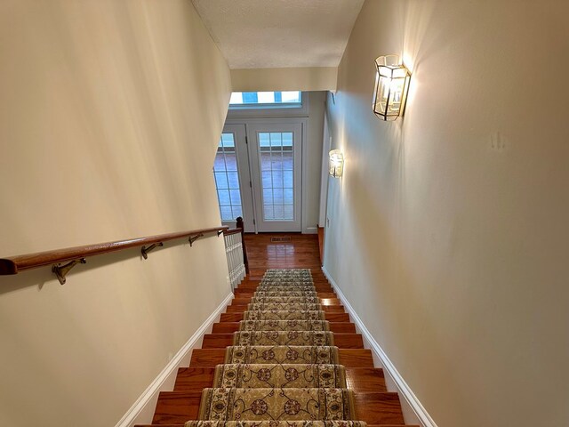 23677 Archery Range Rd, Bristol, VA 24202 - stairs featuring wood finished floors and baseboards