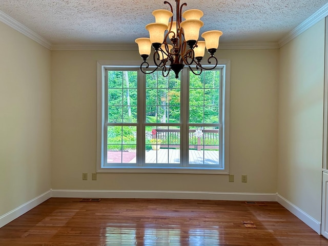 23677 Archery Range Rd, Bristol, VA 24202 - unfurnished room featuring healthy amount of natural light, a chandelier, a textured ceiling, wood finished floors, and crown molding