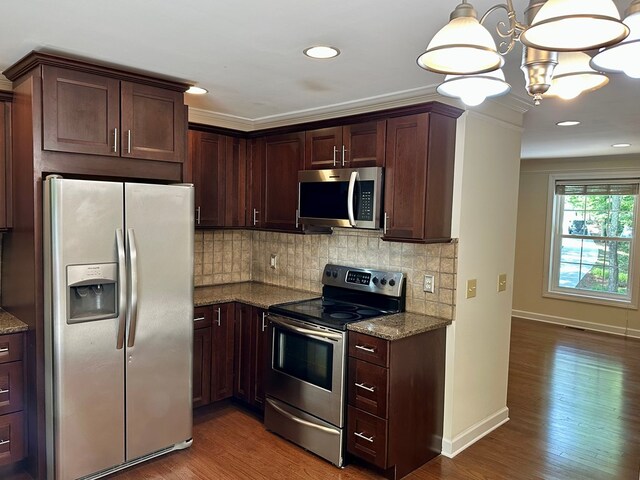 23677 Archery Range Rd, Bristol, VA 24202 - kitchen with stainless steel appliances, wood finished floors, stone counters, tasteful backsplash, and recessed lighting