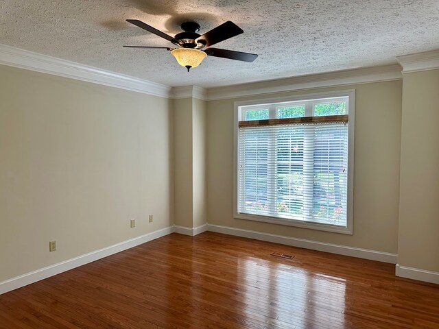 23677 Archery Range Rd, Bristol, VA 24202 - spare room with a textured ceiling, wood finished floors, ornamental molding, and a ceiling fan