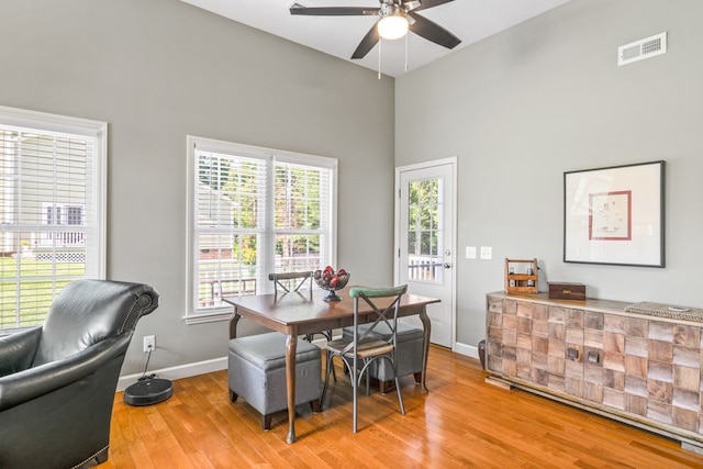 dining room featuring ceiling fan and light wood-type flooring