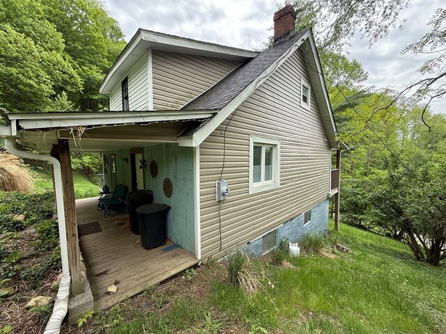 108 Square St, Bluefield, VA 24605 - view of property exterior with a chimney