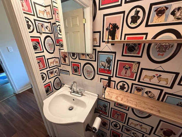 108 Square St, Bluefield, VA 24605 - bathroom featuring a sink, wood finished floors, and baseboards